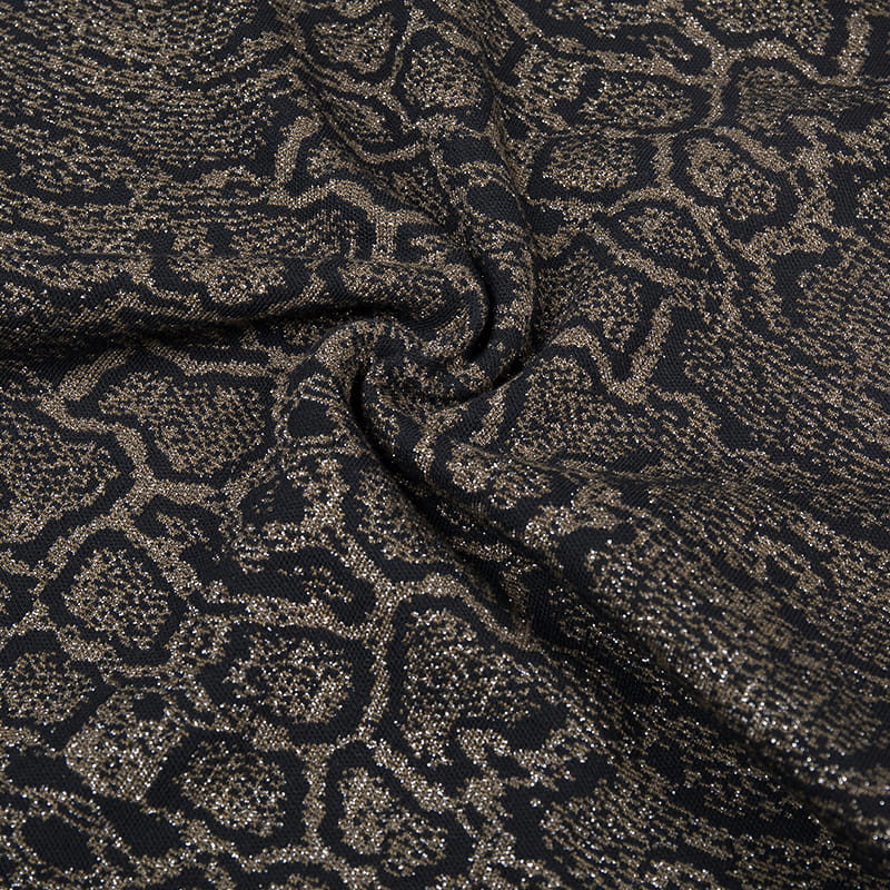 Tela jacquard con estampado de serpiente